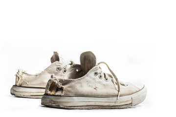 old sneakers isolated on white