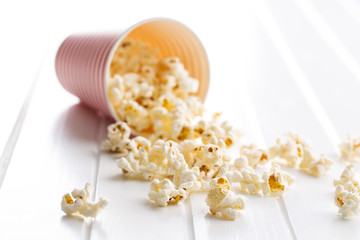Popcorn in paper cup.