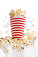 Popcorn in paper cup.