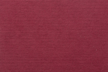 Luxurious red background, handmade paper with stripe.