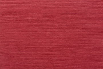 Abstract red background or Christmas paper texture.