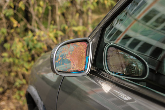 rusty car mirror