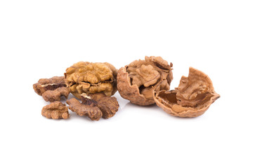 walnut and a cracked walnut isolated on the white background