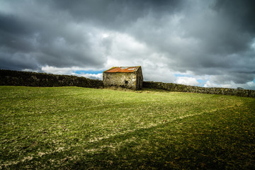 Yorkshire dales barn with stormy sky