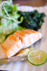 Salmon fish grilled steak and salad