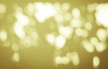 Obraz premium Background bokeh of sun light on the wall
