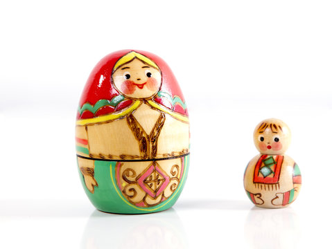 two wooden nesting dolls. mother and son