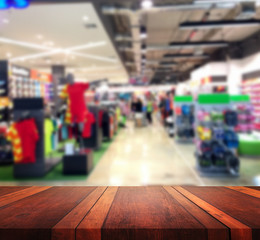 Empty table surface with blurred blackground for product display.