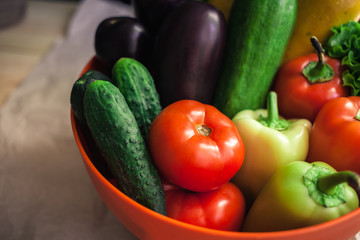 Fresh organic vegetables. Autumn vegetables. Harvesting. Ingredients for the salad. Lettuce, tomatoes, cucumbers, zucchini, eggplant, peppers, chillies.