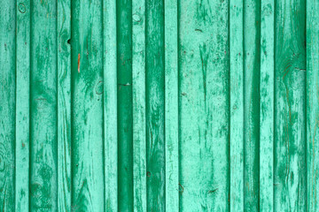 Fototapeta na wymiar Old cracked painted blue-green texture