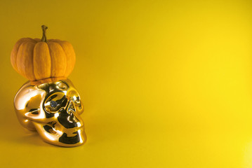 golden skull and pumpkin