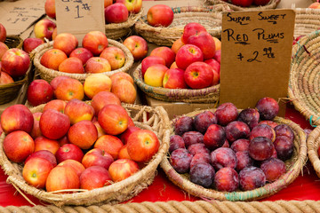 Apples and Plums at fruit market