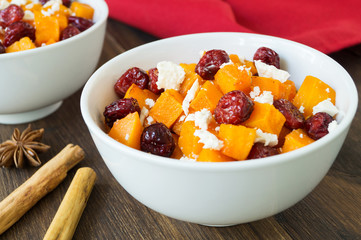 Honey roasted butternut squash with dried cranberries and goat c