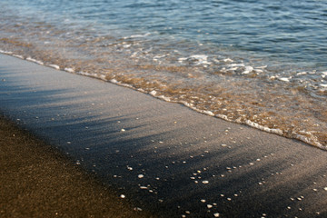 Black sand mud baths found with sea sand

