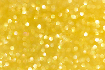 Gold bright blur glitter background