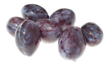 Ripe plums isolated on white background