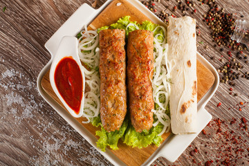 lula kebab on a wooden board 
