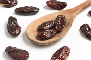 Dried Dates into a spoon. Tamara