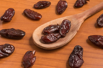 Dried Dates into a spoon. Tamara
