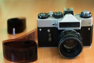 old camera on a wooden background