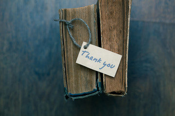 Thank you sign on old book - vintage style