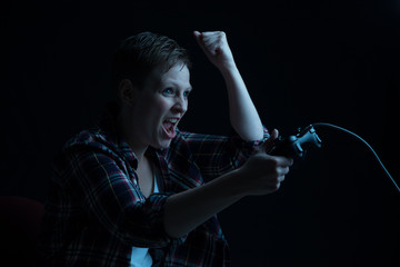 female gamer with wired controller