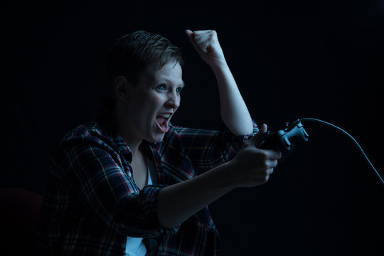 female gamer with wired controller