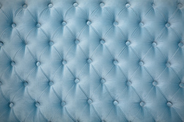 Buttoned on blue texture. Repeat pattern. Luxury classic leather texture with blue color.