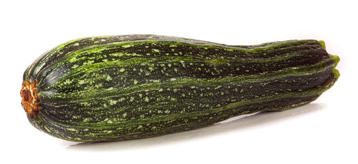 One green zucchini isolated on white background