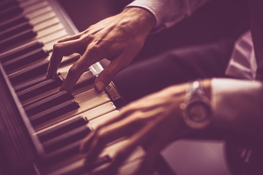 Men Piano Playing