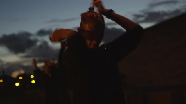 Male Artist Performing Fire Show Outdoors at Evening Time. Shot on RED Cinema Camera in 4K (UHD).