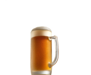 cold beer in a glass on a white background