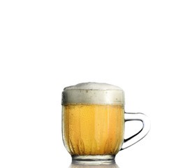 cold beer in vintage glass on a white background