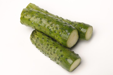 salted cucumber on white, traditional snack while drinking vodka