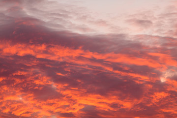 Fototapeta premium Colorful warm clouds on sky at sunset