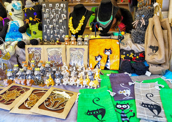 Souvenirs with cat symbol displayed at Riga Christmas market