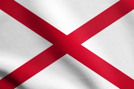 Flag of Alabama waving with fabric texture