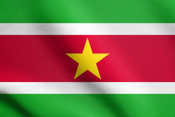 Flag of Suriname waving with fabric texture
