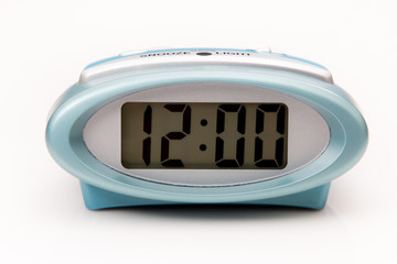 Digital clock displaying 12:00 o'clock on a white background - 121684770