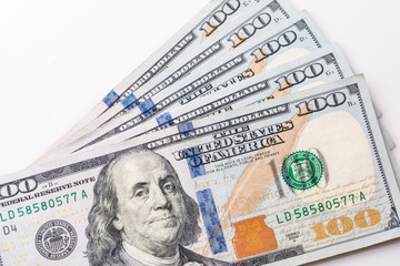 Obraz na płótnie Canvas Five $100 dollar bills in United States currency.