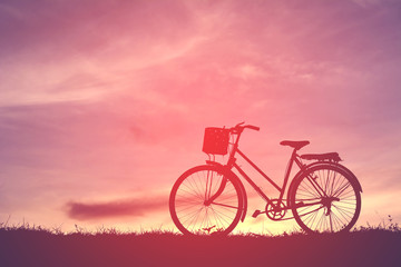 Fototapeta na wymiar Silhouette bicycle at sunset