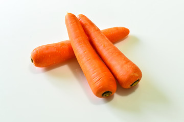 Carrots in the isolated white background, raw food
