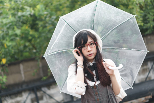 Asian girl with umbrella