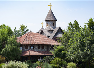 Fototapeta na wymiar church against the background of trees in Stanisici Bosna and Hercegovina