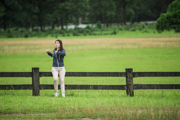 Women enjoying nature in meadow.
