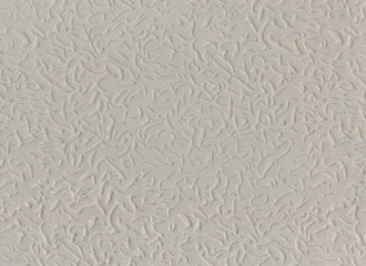 Soft white fabric texture with an abstract pattern
