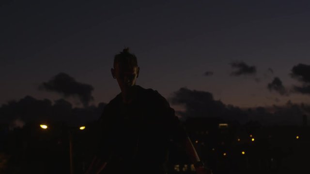 Male Artist Performing Fire Show Outdoors at Evening Time. Shot on RED Cinema Camera in 4K (UHD).