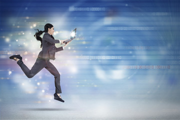 Fototapeta na wymiar Businesswoman running in virtual world