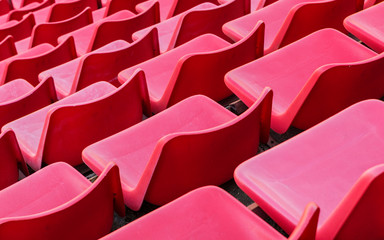 Football stadium bleachers red chairs