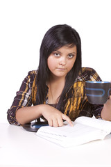 Cute Woman Studying at her Desk